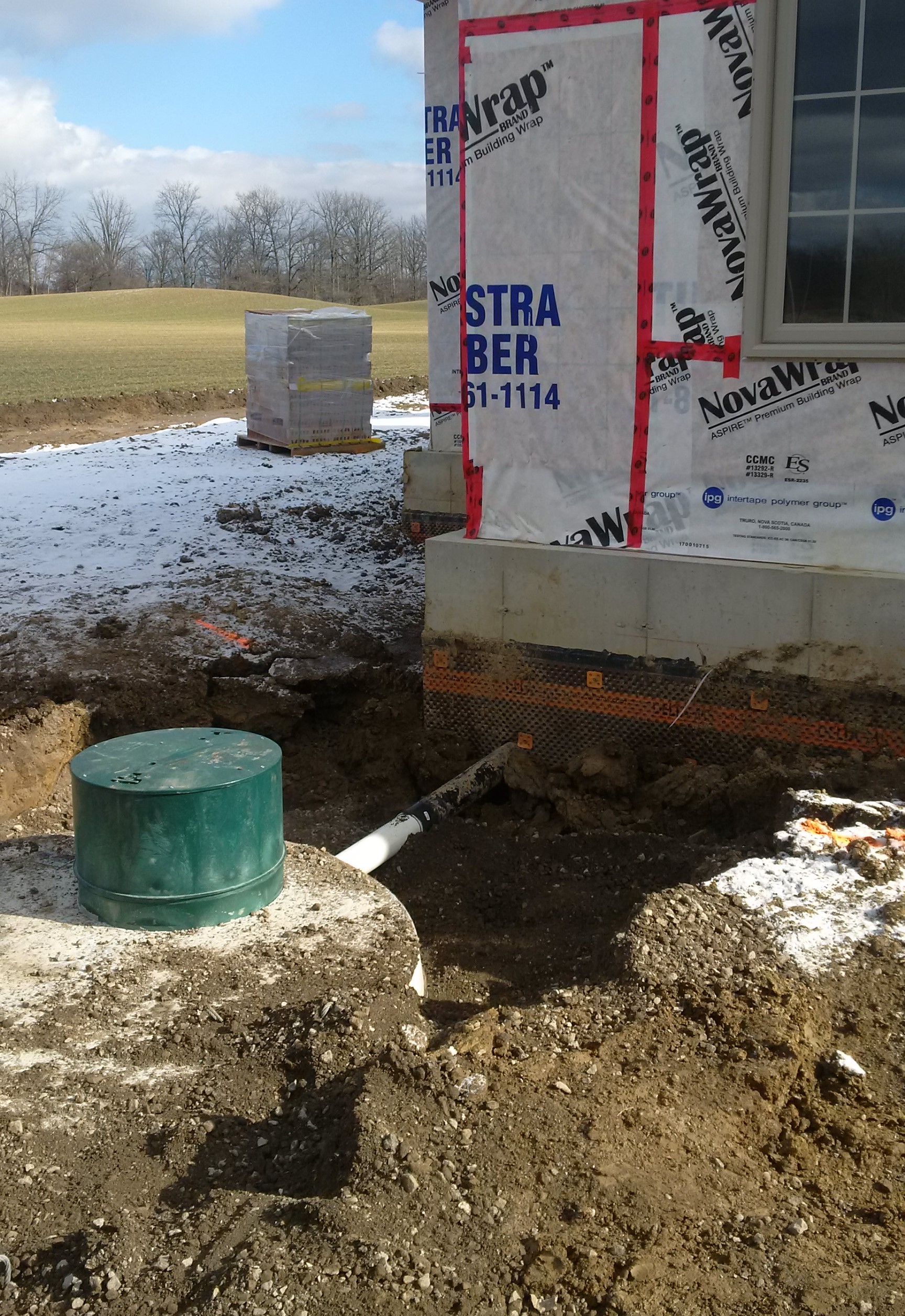 Septic tank installed 1.5 meters from the house with PVC to ABS transition in Ancaster, Ontario