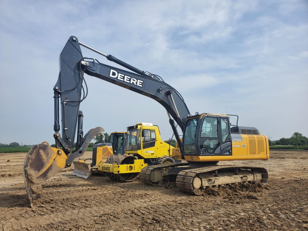 Excavator and dozer working on an earthworks site