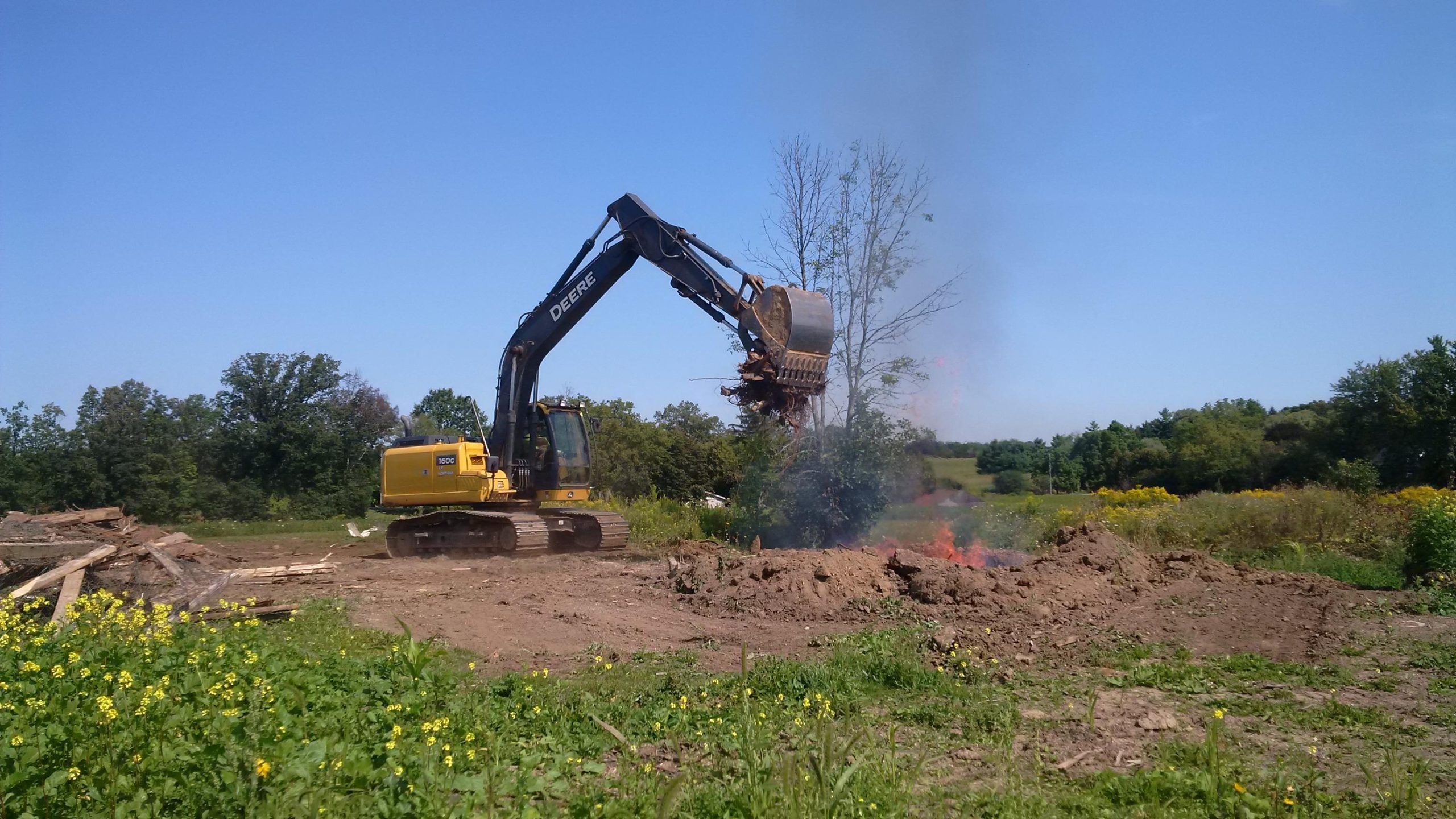 Permitted on-site burning of clean wood for agricultural demolition in Hamilton