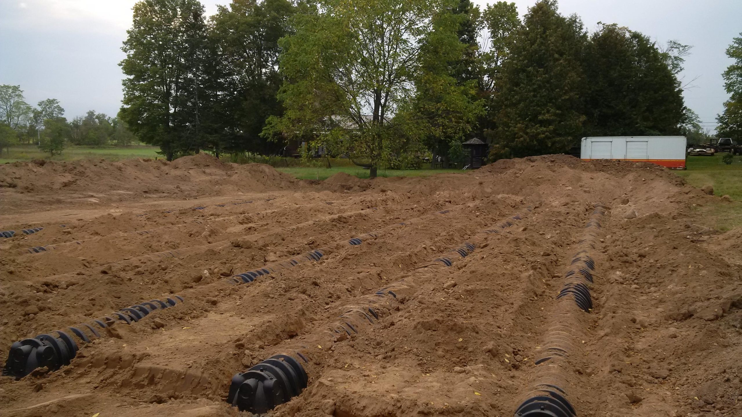 Septic leaching chambers installed in Burlington, a modern alternative to traditional pipe and gravel septic beds.