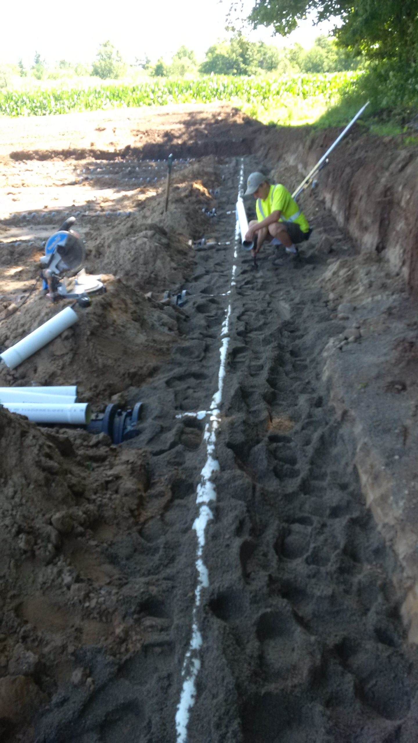 Septic chamber leaching bed with four-inch PVC header in Waterdown, Ontario